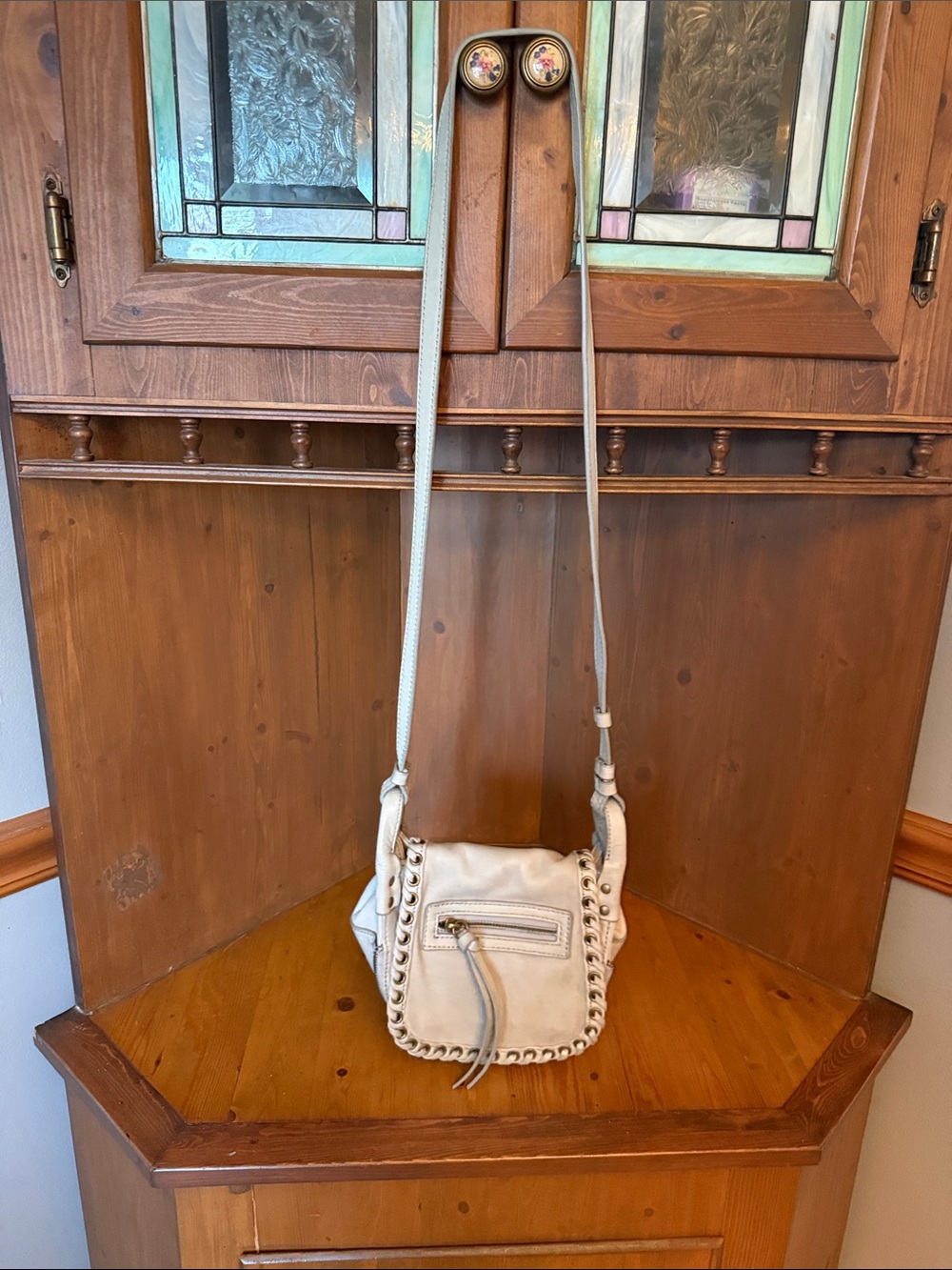 Joelle Hawkens small gray
Leather Whipstitch Crossbody Saddle Bag